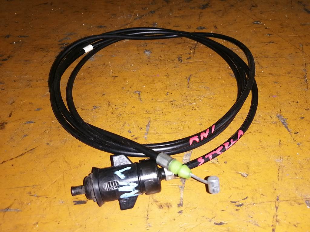 тросик лючка бака Subaru Stella