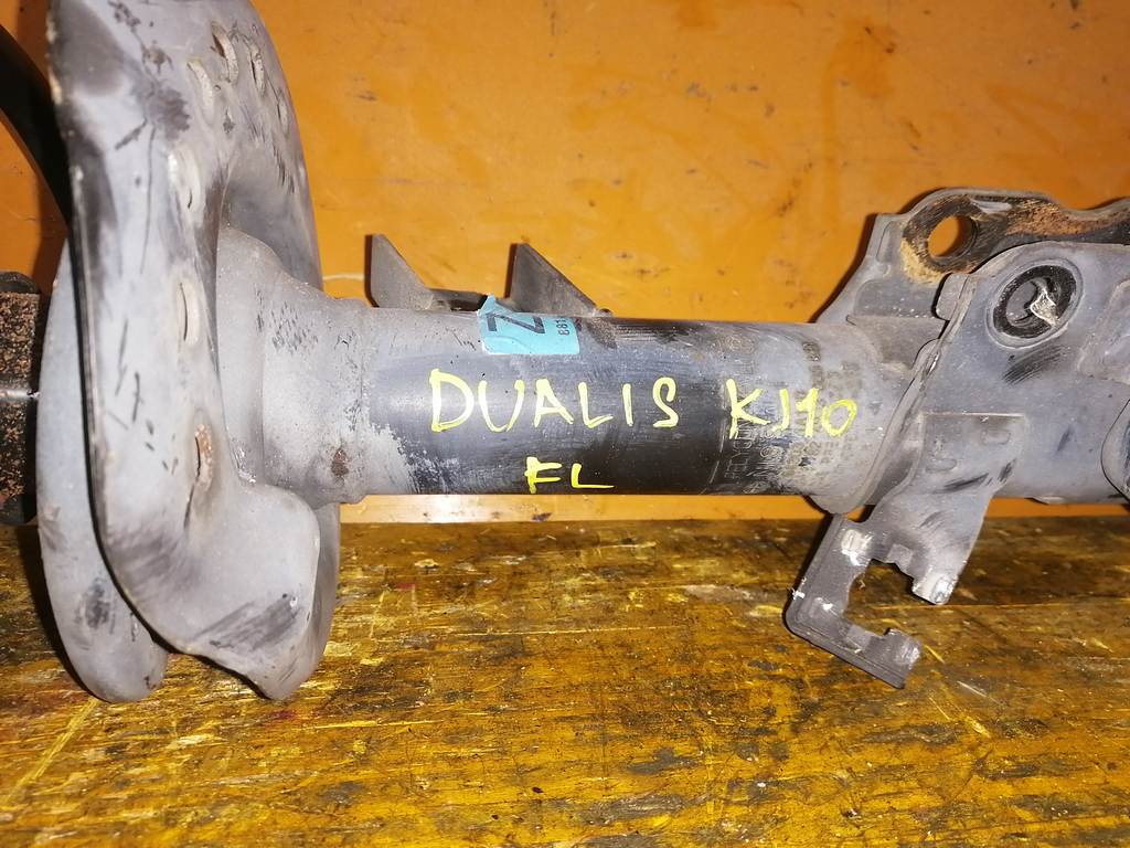 DUALIS KJ10 СТОЙКА ПЕРЕДНЯЯ ЛЕВАЯ Nissan Dualis